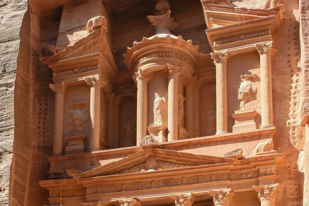 The Treasury carved into rock at Petra